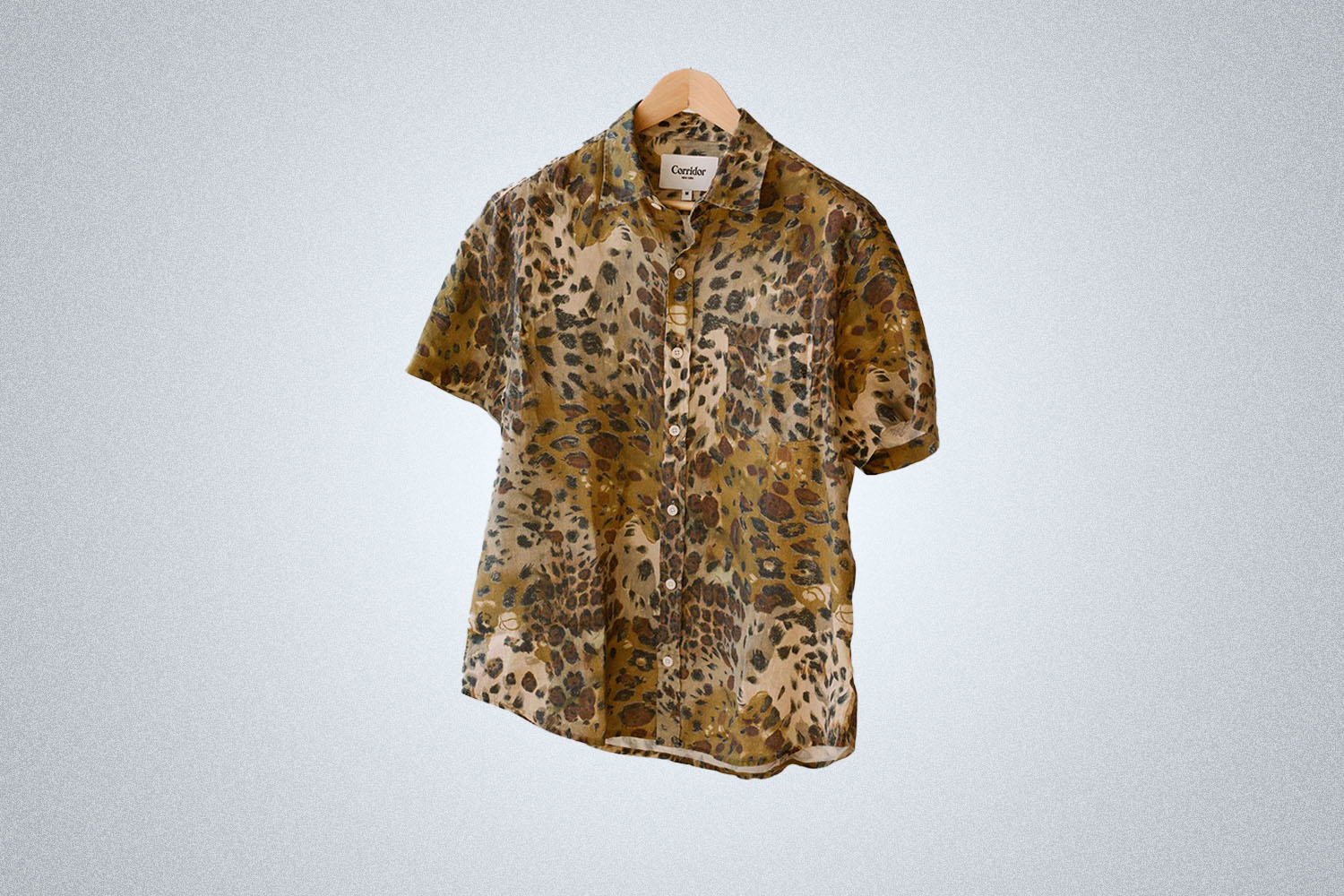 a tiger printed shirt from Corridor on a grey background