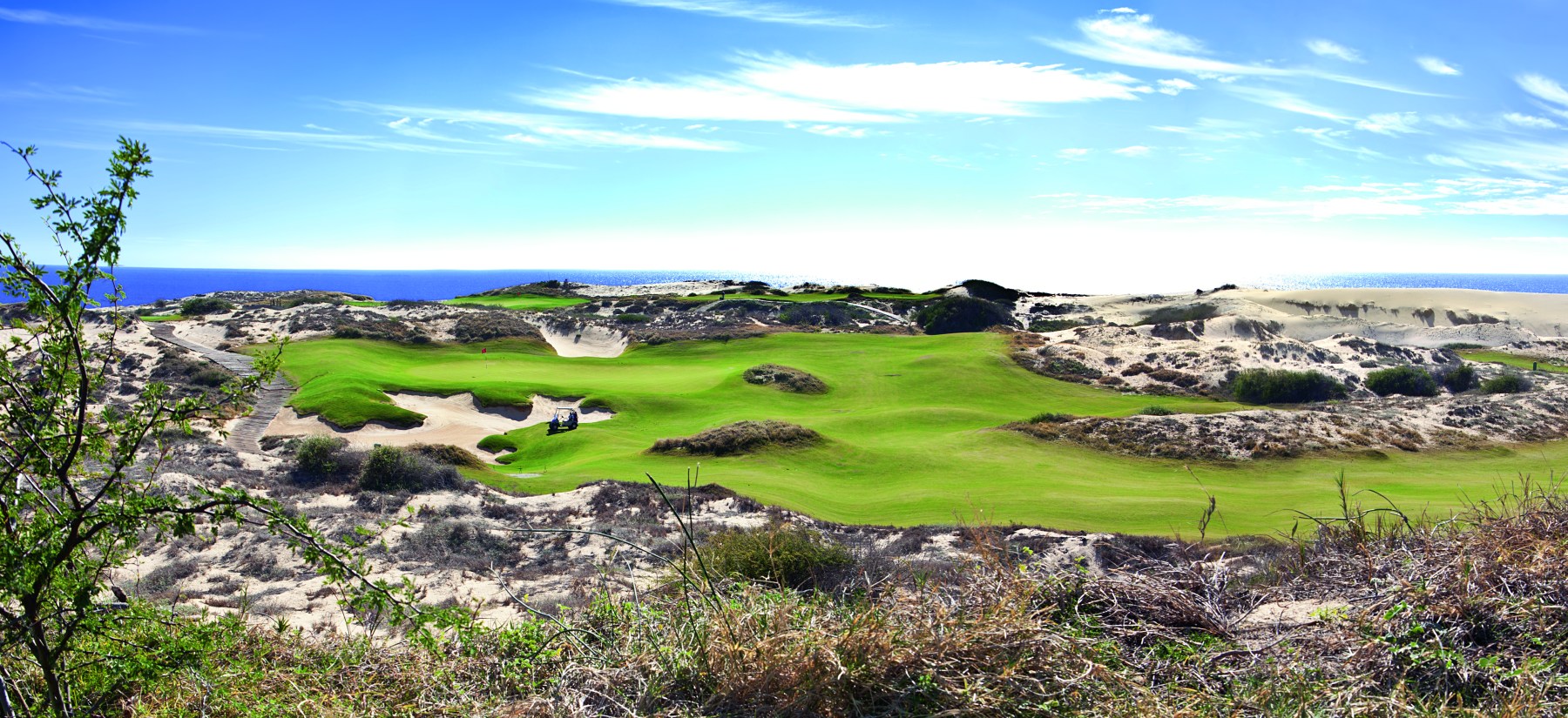 <strong>DIAMANTE CABO SAN LUCAS: DUNES</strong>, Mexico. The eponymous dunes create an otherworldly golf landscape.<br><br>Waldek says: “Diamante Cabo San Lucas’ Dunes Course, is one of the most highly ranked in Latin America. There’s the bright green of the grass, the deep azure of the sea, the pale blue of the sky and the stark beige of the sand dunes, which all together make for one beautiful golf course.”<br>