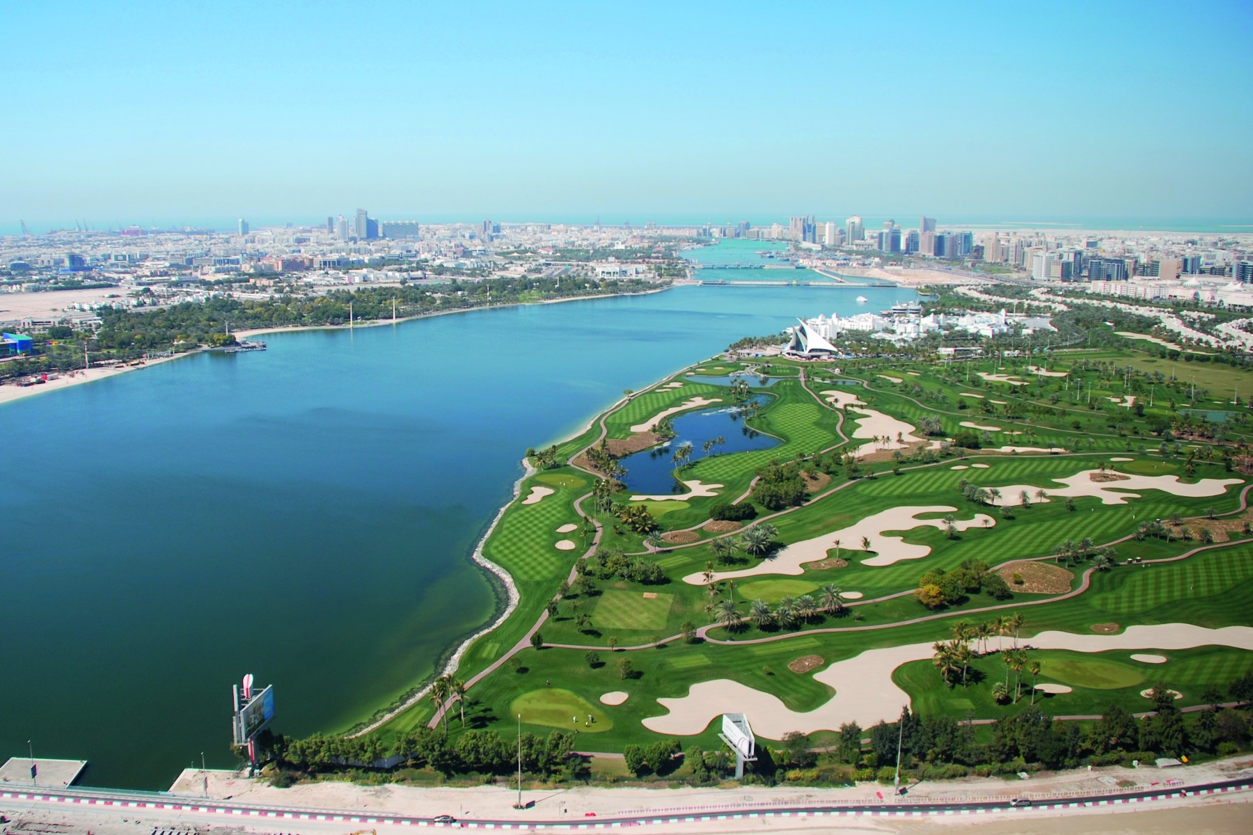 <strong>DUBAI CREEK GOLF & YACHT CLUB: CHAMPIONSHIP</strong>, Dubai, UAE. There’s a “floating” tee at hole six.<br><br>Waldek says: “For a desert golf course, it’s unusual that water plays so prominently in the design. But that’s exactly what happens at the club’s Championship Course. The eponymous creek affects four holes — including the sixth, where golfers must tee off from a platform on the water. Artificial lakes add to the difficulty of other holes.”<br>