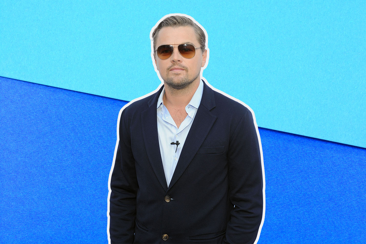 A photo of Leonardo DiCaprio wearing sunglasses against a two-toned blue background