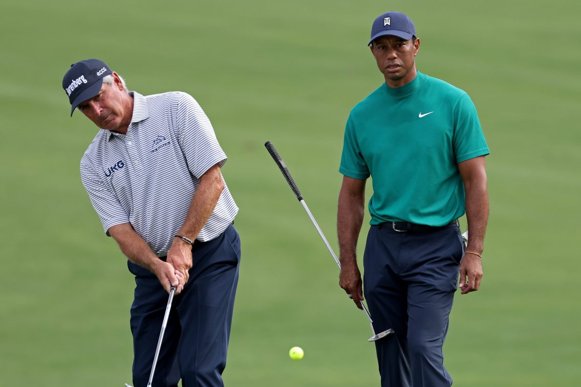 Tiger Woods talks to Fred Couples at the Masters at Augusta National Golf Club in 2020