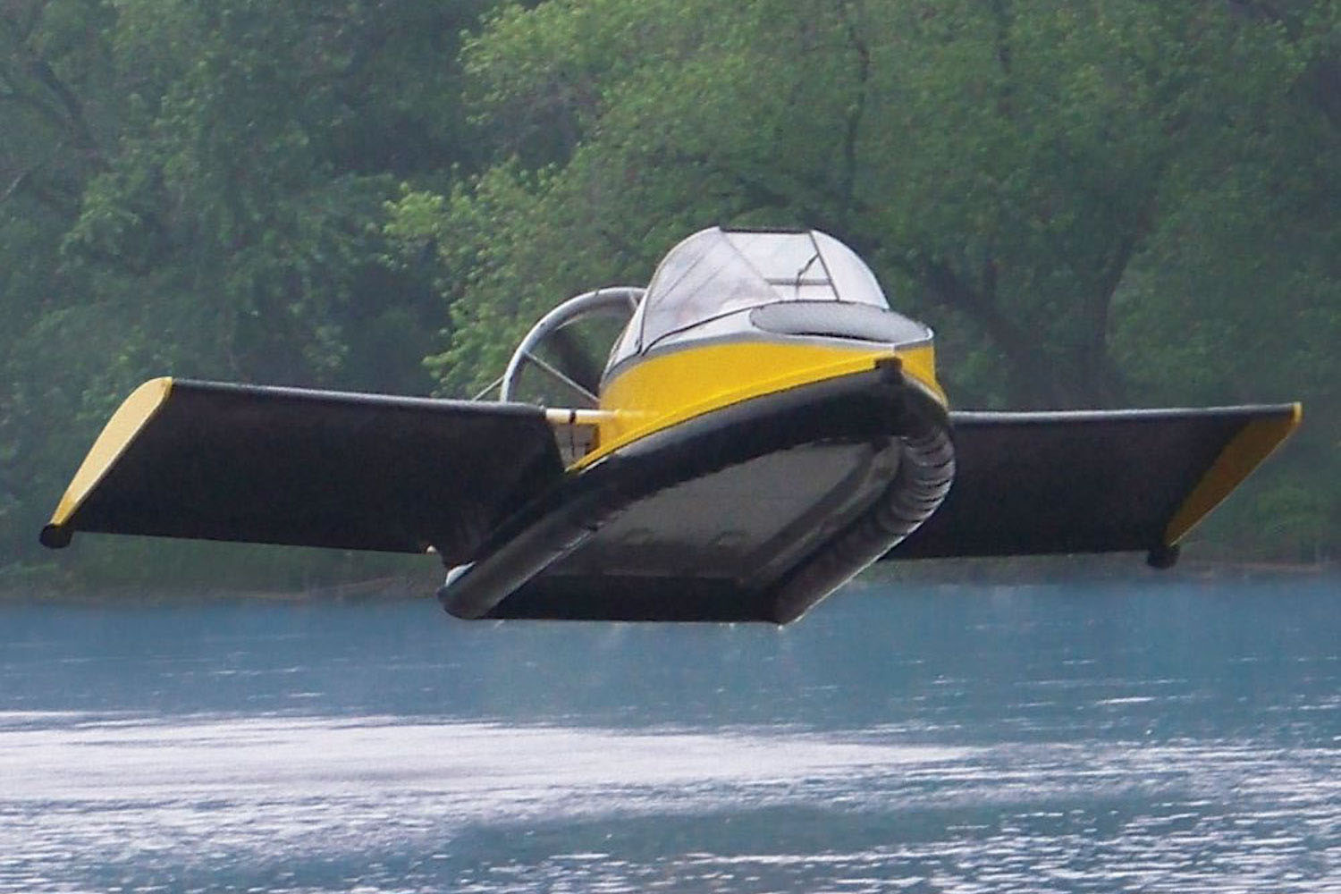a yellow flying hovercraft