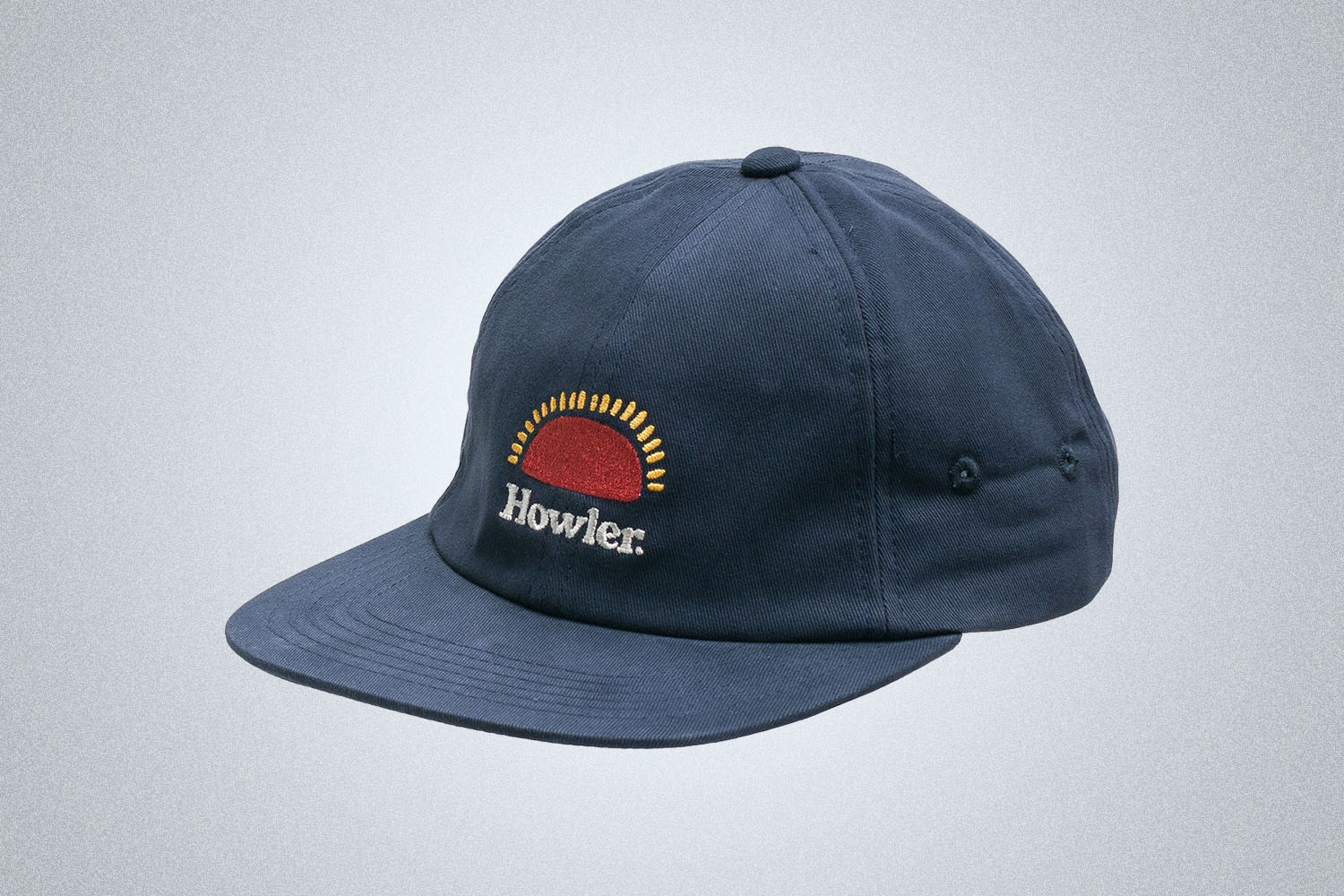 a navy flat-brimmed Holwer Brothers Logo Hat on a grey background