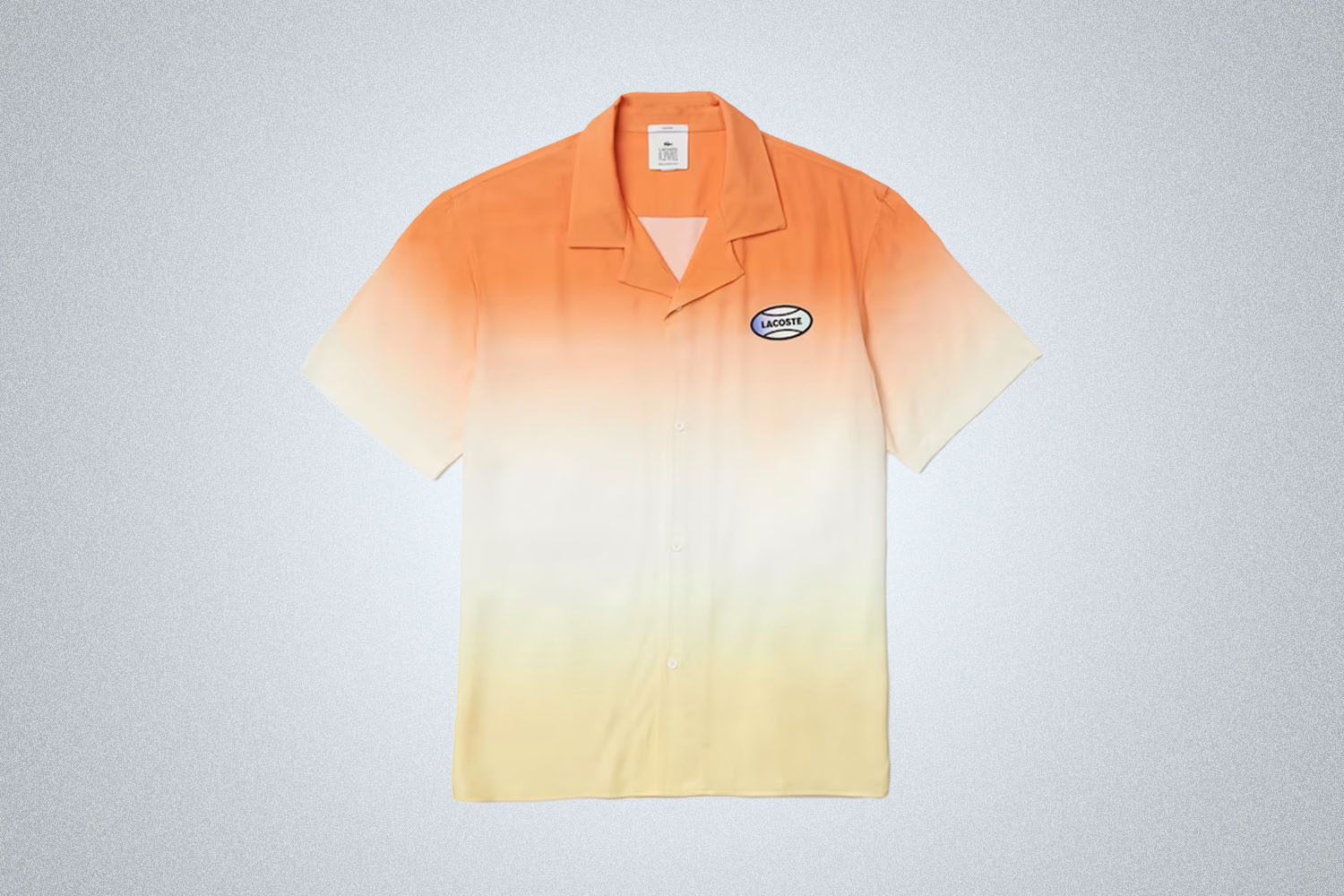 a orange, white and yellow gradient shirt from Lacoste on a grey background