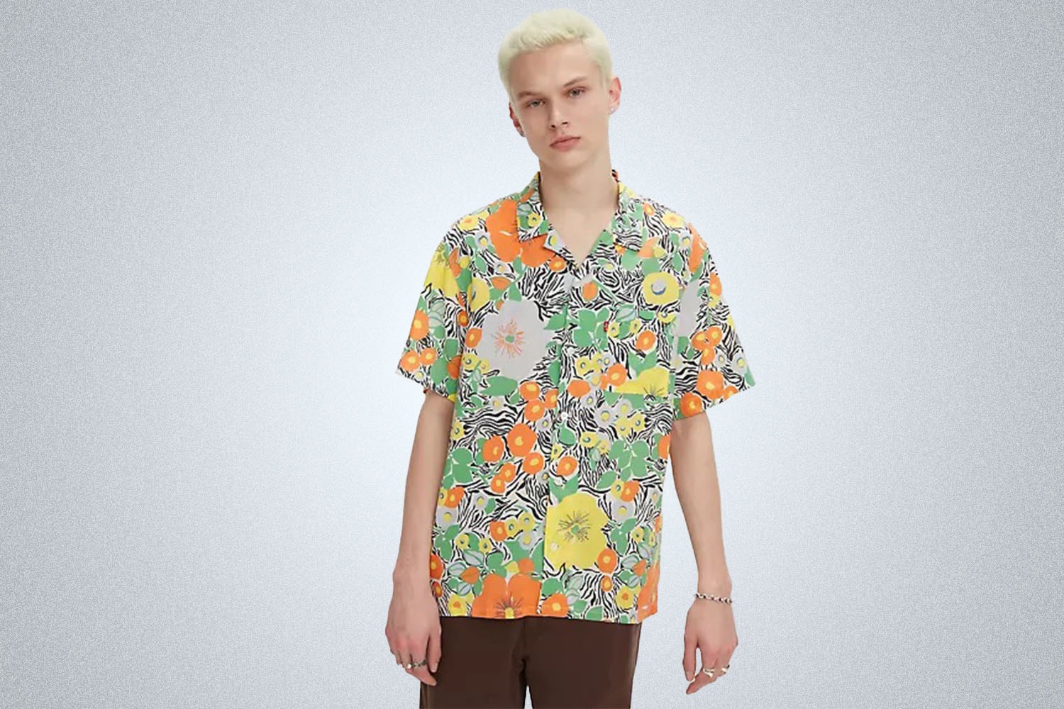 a green floral shirt from Levi's on a grey background