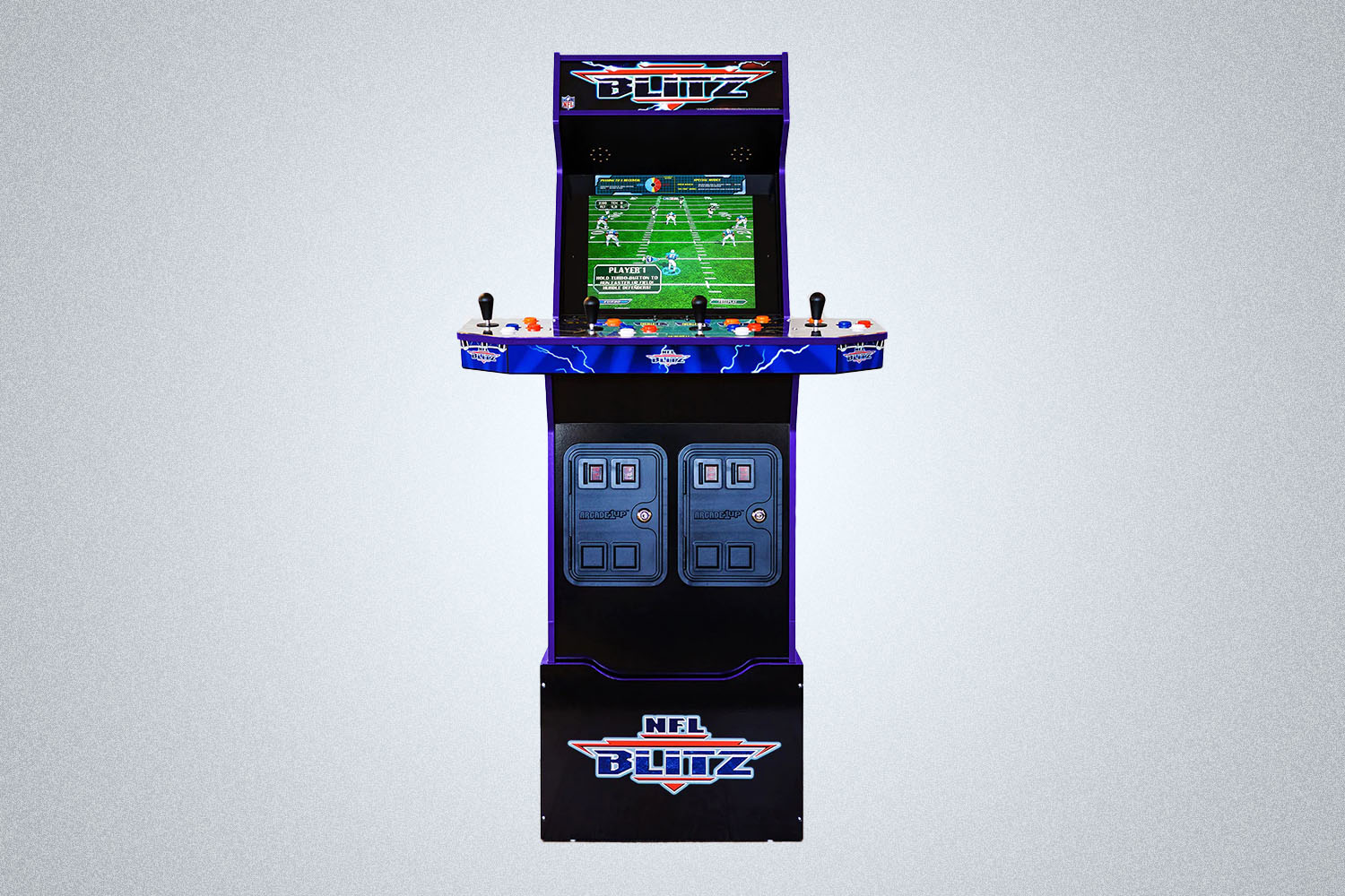 an NFL Blitz arcade machine on a grey background