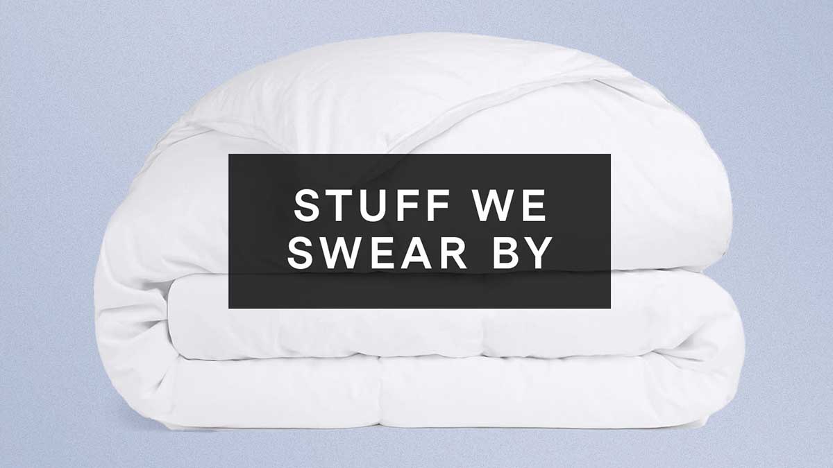 Parachute's Duvet Insert overlaid with "Stuff We Swear By" on a purple background
