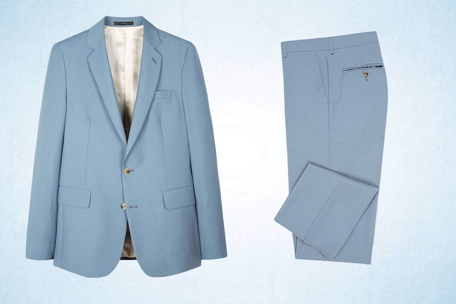 a ice blue, single-breasted suit jacket and pants from Paul Smith on a ice-blue background
