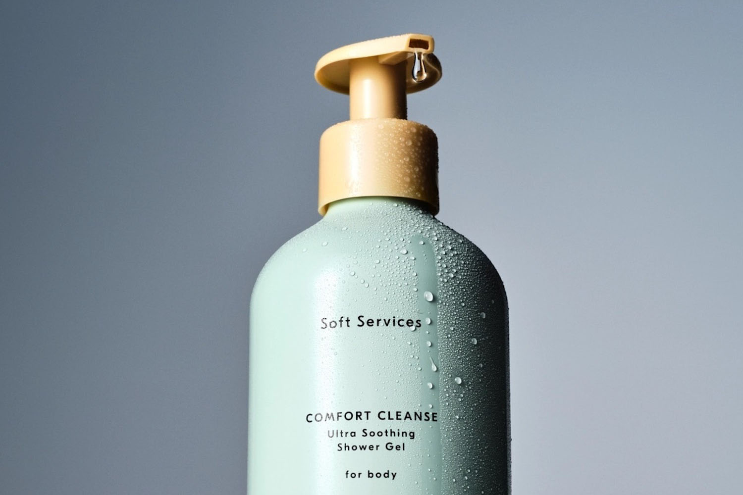 a close up ohoto of the Soft Services Shower Gel on a dark grey background