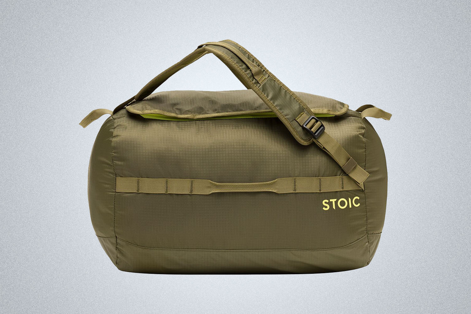 a round green duffle from Stoic on a grey background