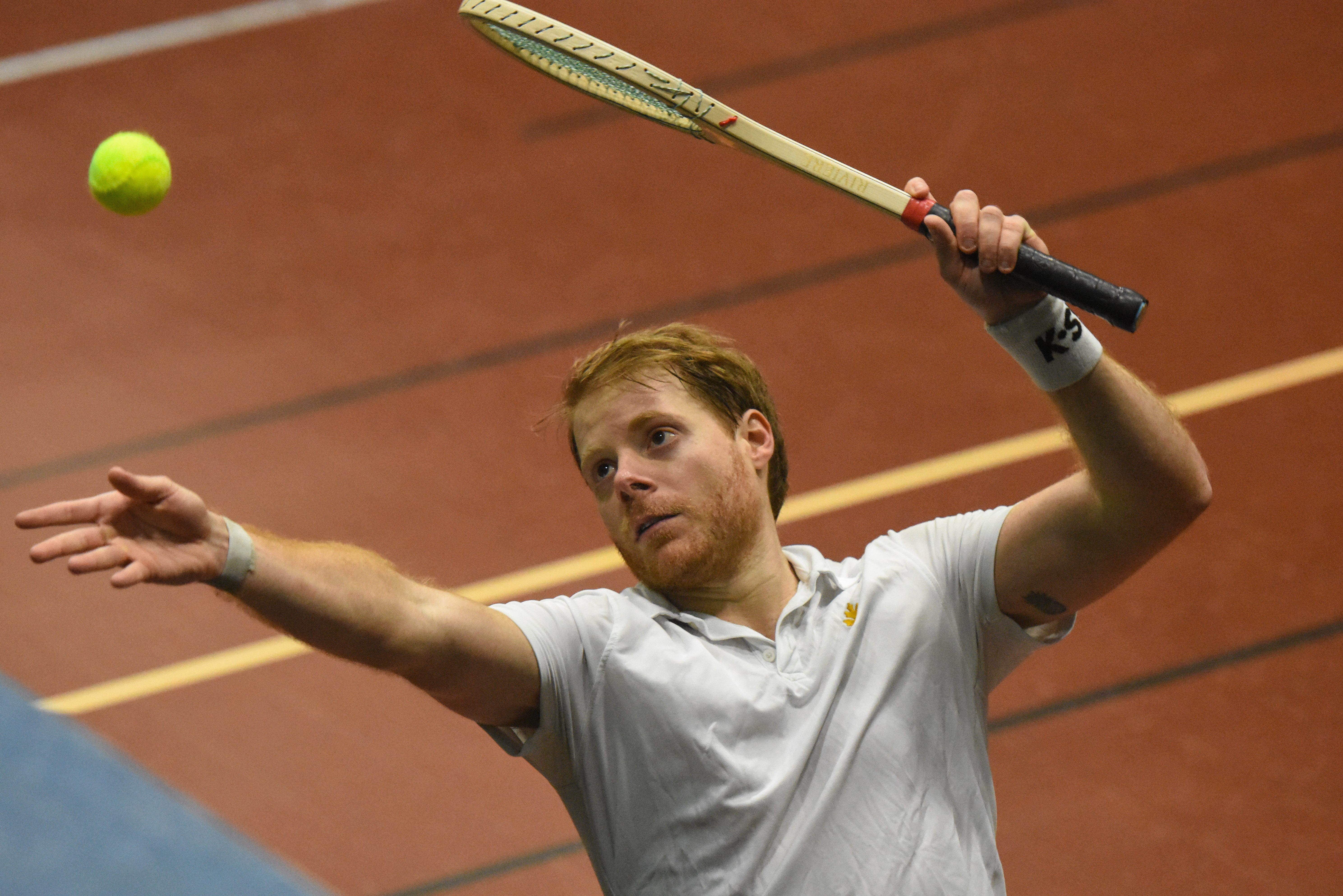 Court tennis star Camden Riviere plays a shot.