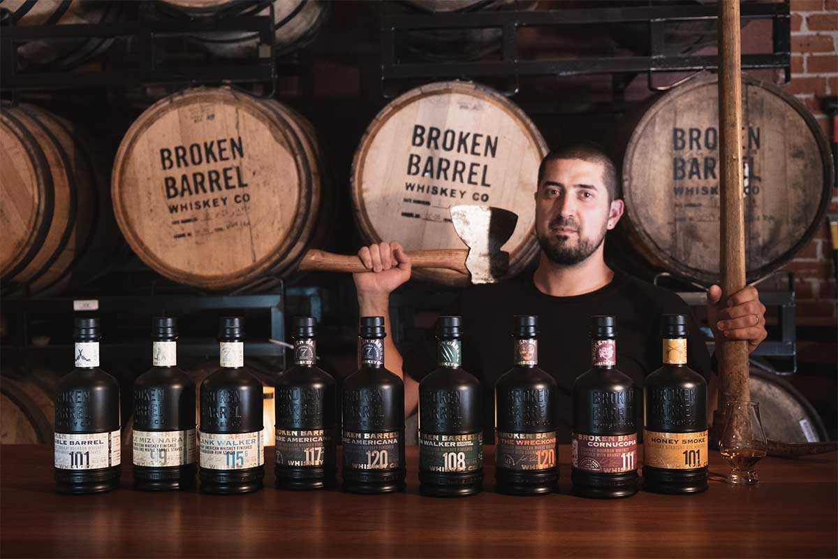 Broken Barrel releases and founder Seth Benhaim, holding an ax ... the brand breaks up barrels and uses the staves to help develop younger whiskeys