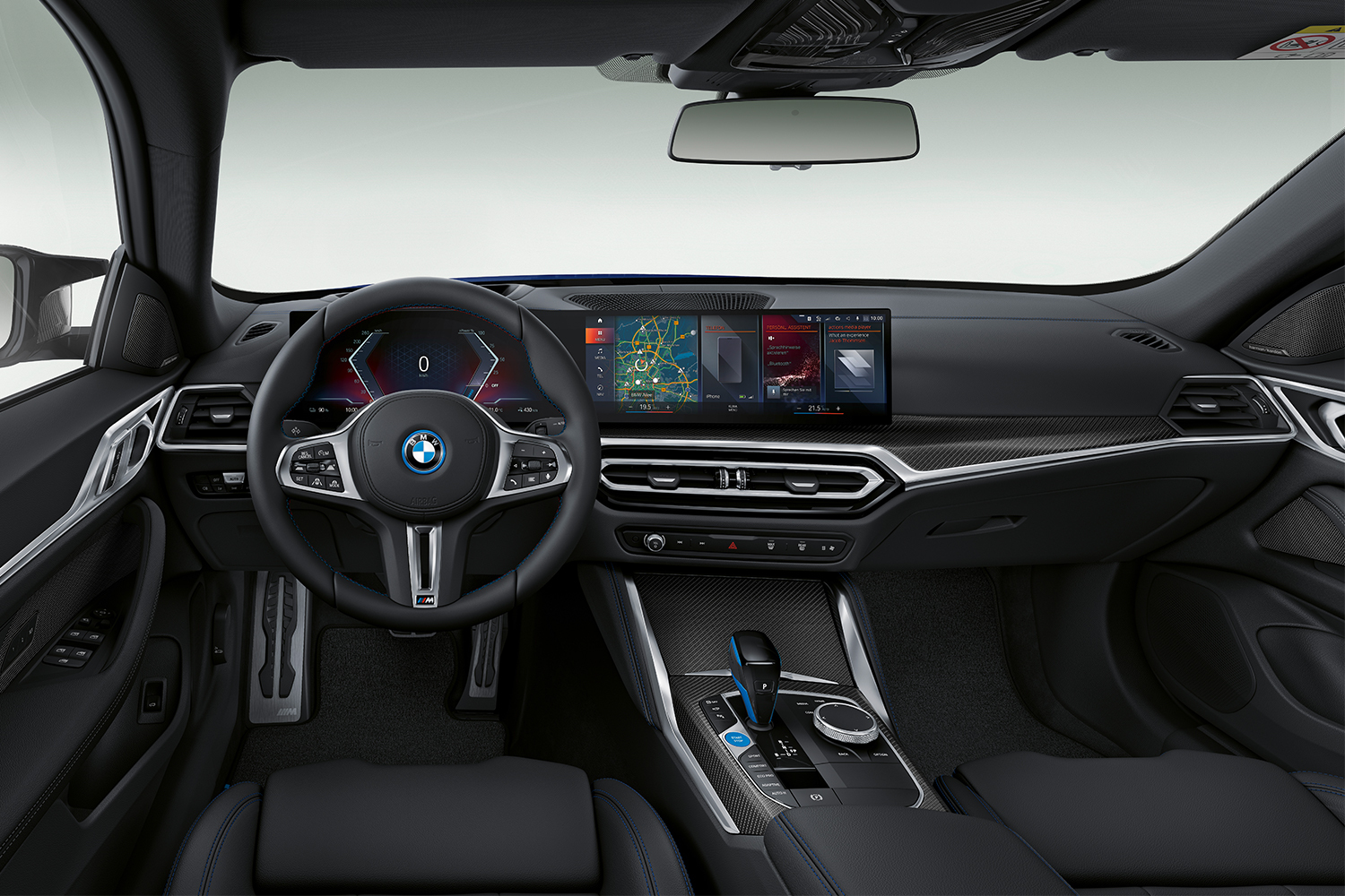 The dashboard of the all-electric 2022 BMW i4 M50 four-door car