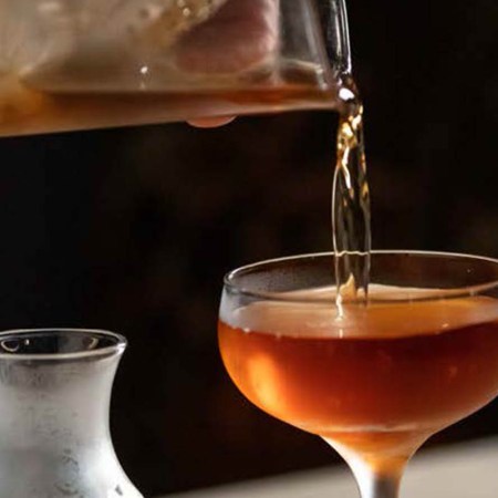 Pouring a Vice and Virtue cocktail at The Violet Hour in Chicago. This is a drink that utilizes the Vieux Carré as its drinks templates