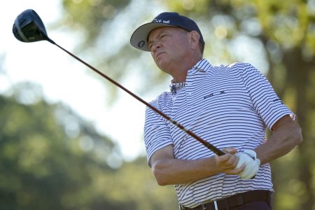 Davis Love III of the United States plays a shot at the Rocket Mortgage Classic. He hinted at PGA Tour golfers boycotting the majors over LIV Golf players.