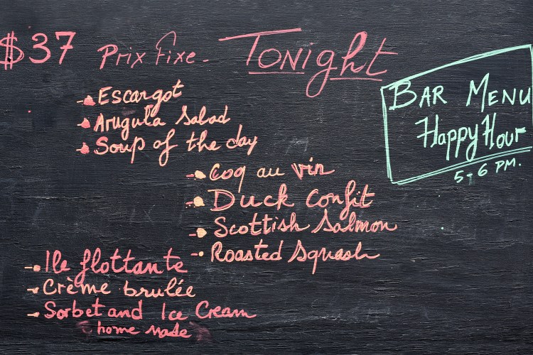 Restaurant menu on a chalkboard