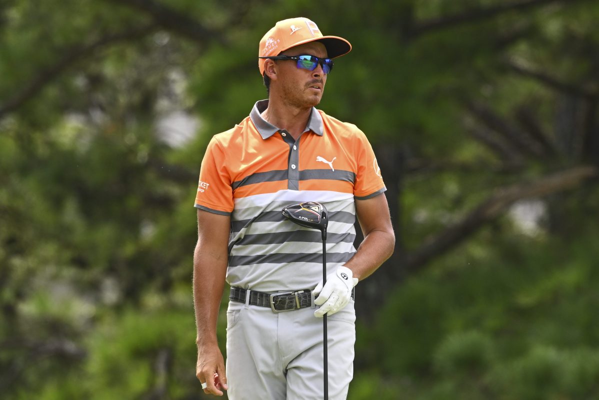 Rickie Fowler watches his tee shot during the final round of the FedEx St. Jude Championship.
