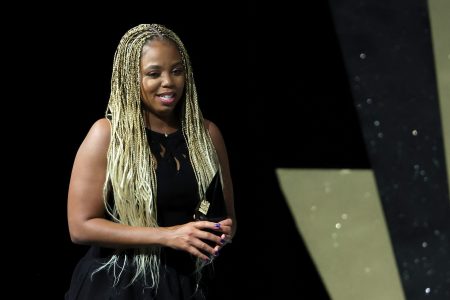 Jemele Hill accepts the William C. Rhoden Sports Media Award in 2022