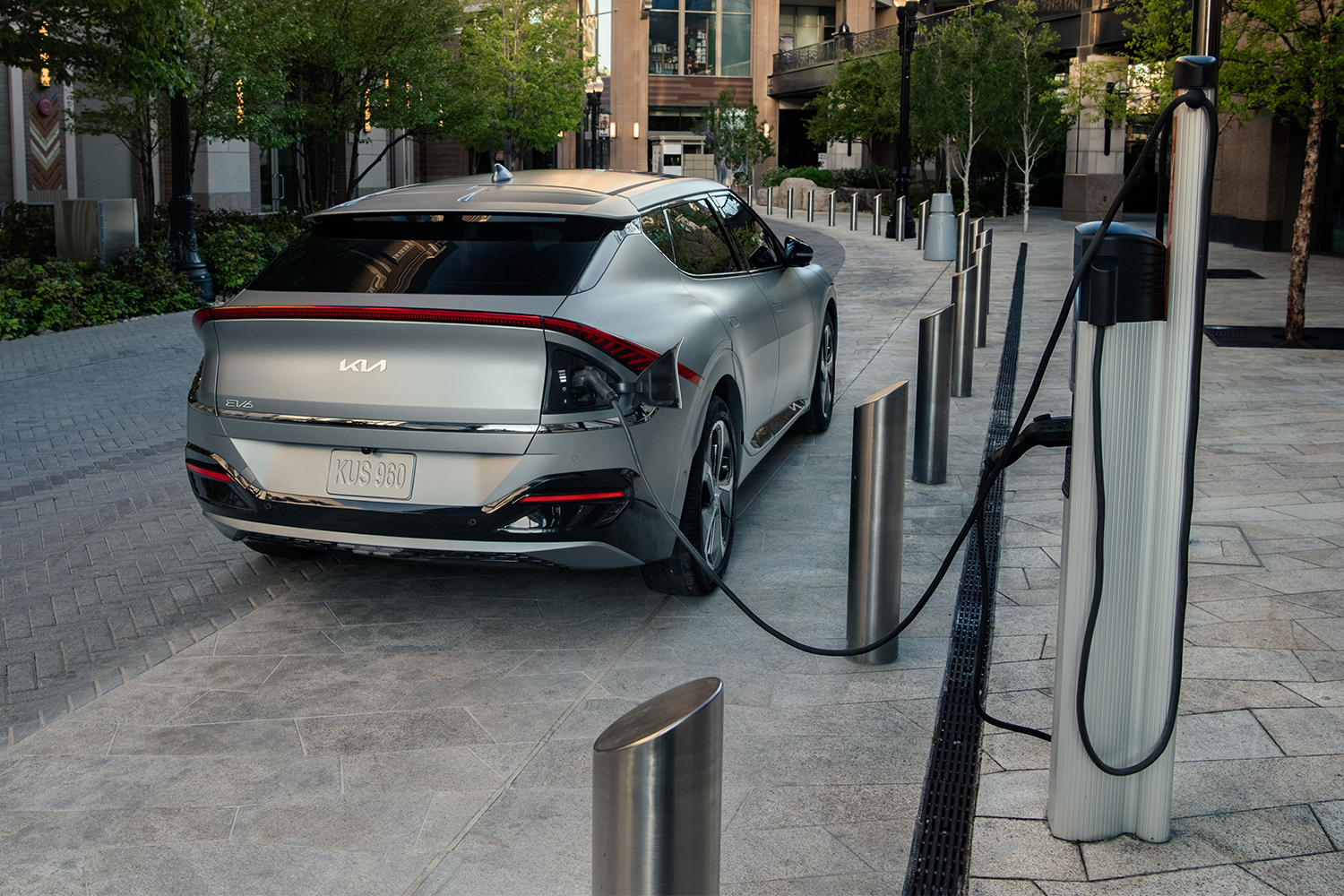 A 2022 Kia EV6 charging at an electric car charging station