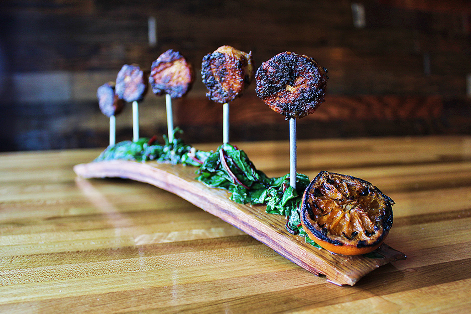 Bourbon-braised pork belly lollipops from Texas restaurant Rye