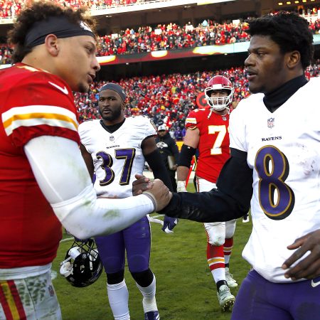 Black quarterbacks Patrick Mahomes and Lamar Jackson greet each other after a 2018 game