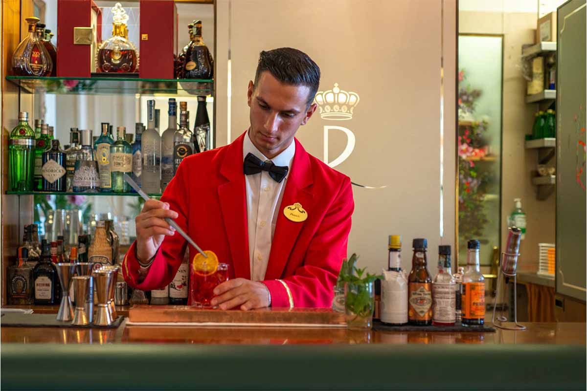 A bartender making a Negroni at the Bar delle Rose in the Royal Hotel Sanremo