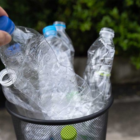 A recycling can full of plastic water bottles — a new study suggests most plastic water bottles in France are full of microplastics, which might have a detrimental effect on the environment and your health