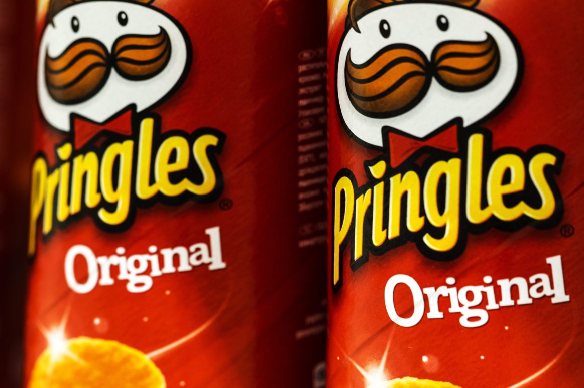 Cans of Pringles wheat-based stackable snack chips.
