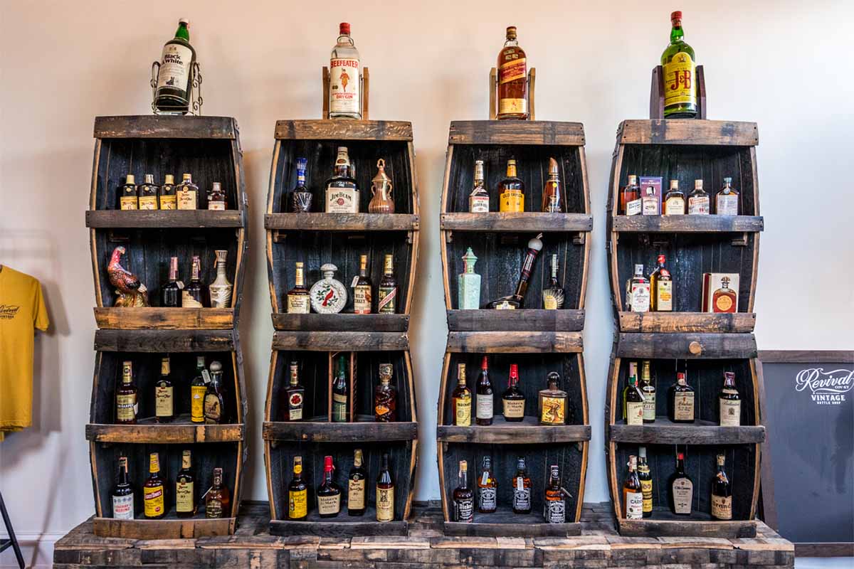four bookshelves of booze at Revival Vintage Spirits