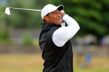 Tiger Woods plays a shot at the 150th Open at St Andrews Old Course in Scotland