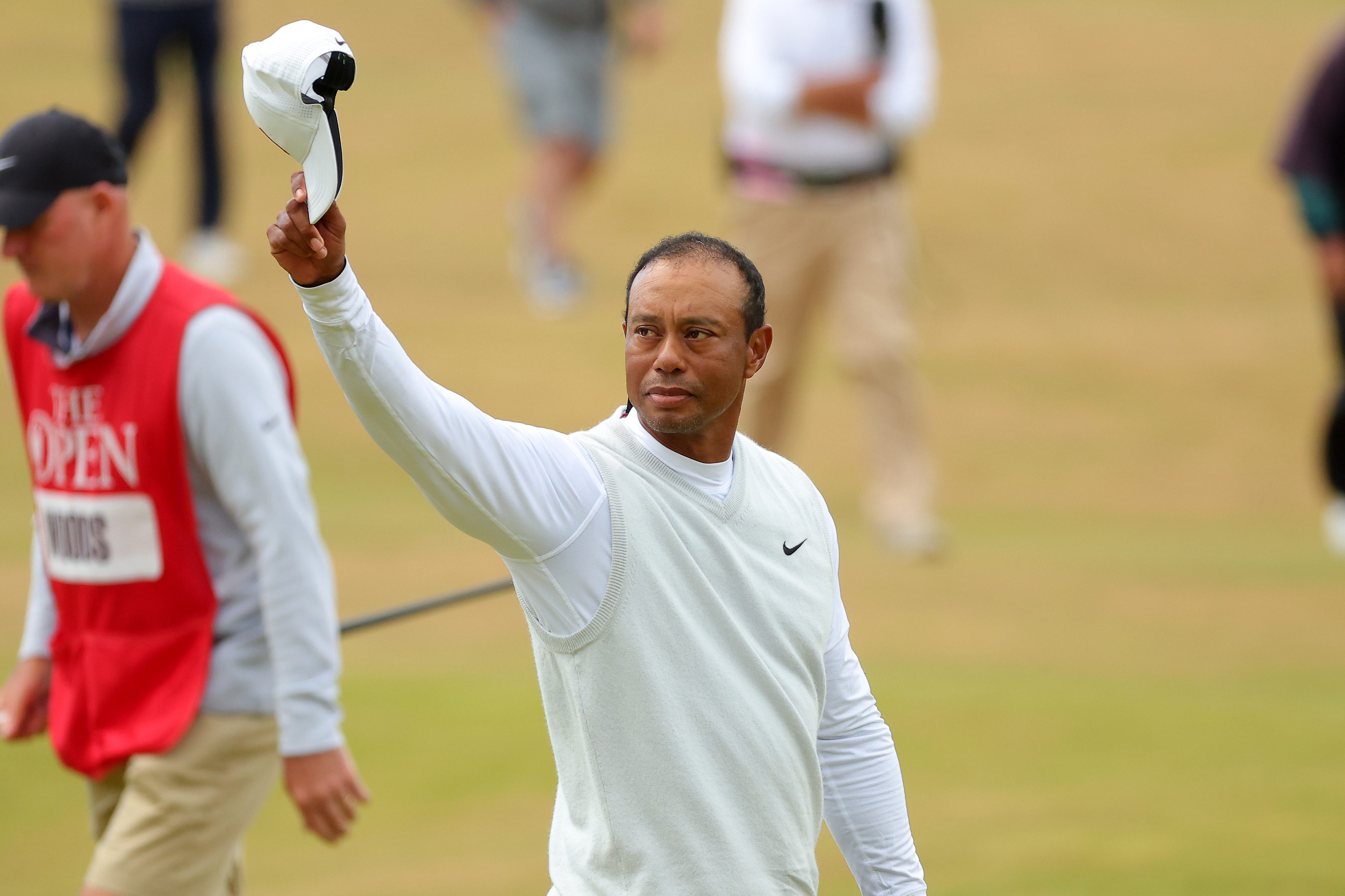 Tiger Woods waves to the crowd at the 150th Open at St Andrews.