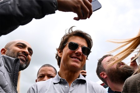 Actor Tom Cruise walks in the Paddock prior to the F1 Grand Prix of Great Britain at Silverstone