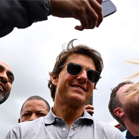 Actor Tom Cruise walks in the Paddock prior to the F1 Grand Prix of Great Britain at Silverstone