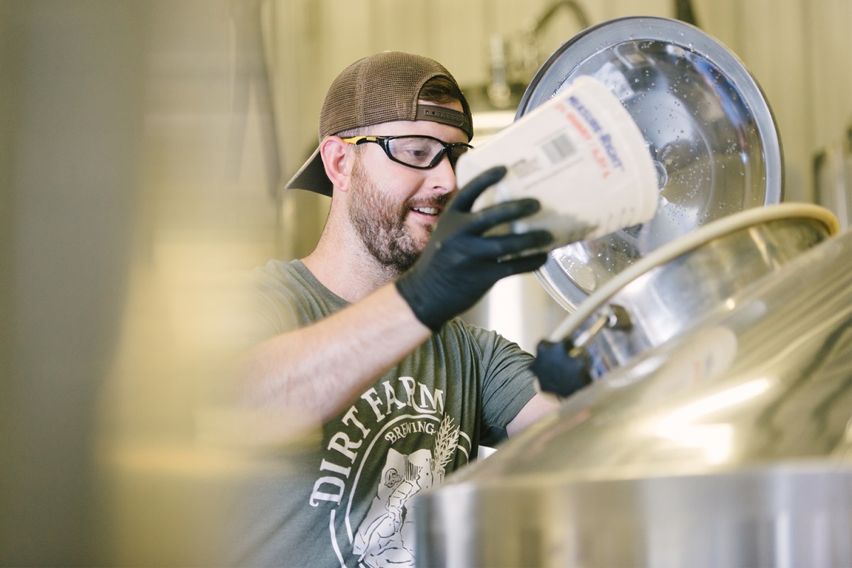 Wes Schoeb, the head brewer at Dirt Farm Brewing, making beer at the DC brewery