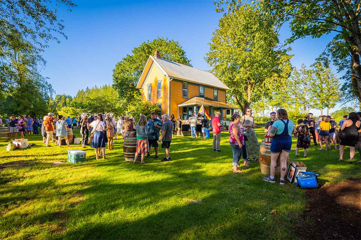 Drinkers soaked up the sun on acreage of Remy Drabkin's winery for Queer Wine Fest, held June 24
