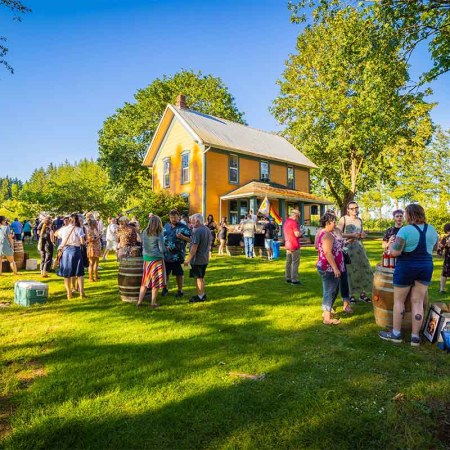 Drinkers soaked up the sun on acreage of Remy Drabkin's winery for Queer Wine Fest, held June 24