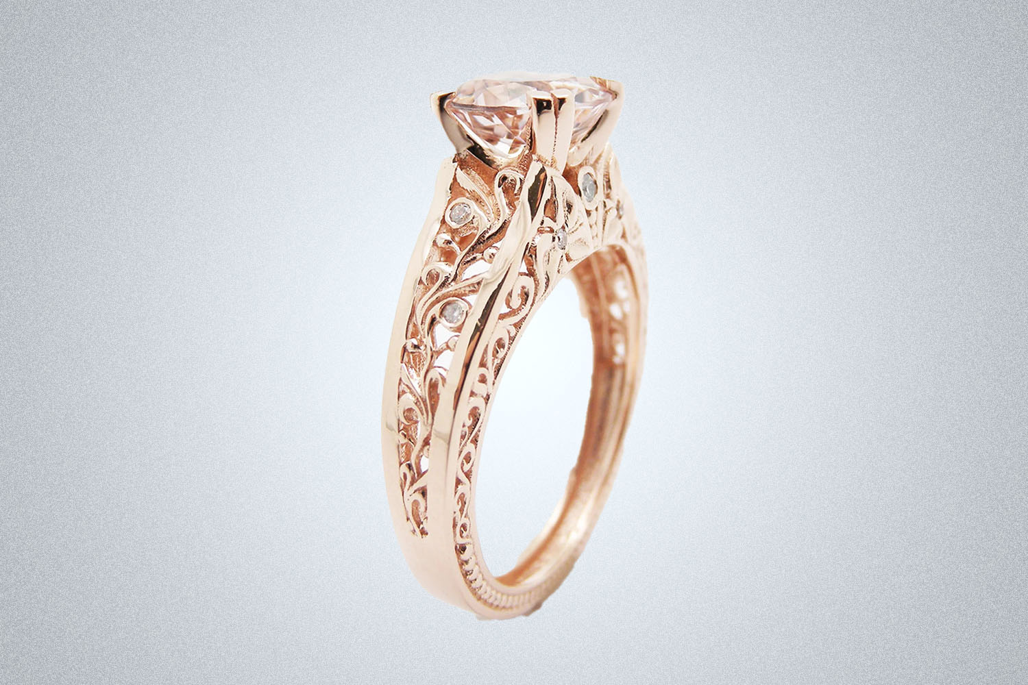 An AyalaDiamonds Vintage Engagement Ring 14K Rose Gold on a gray background.
