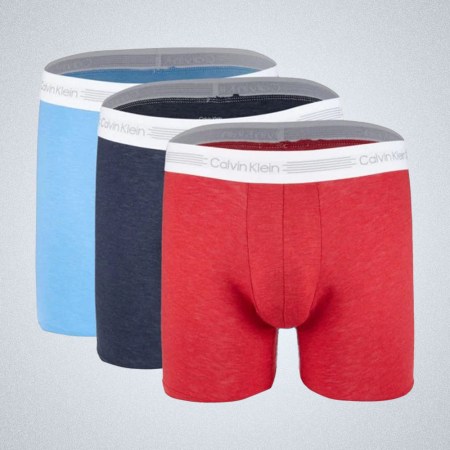 a three-pack of underwear in multiple colors from Calvin Klein on a grey background