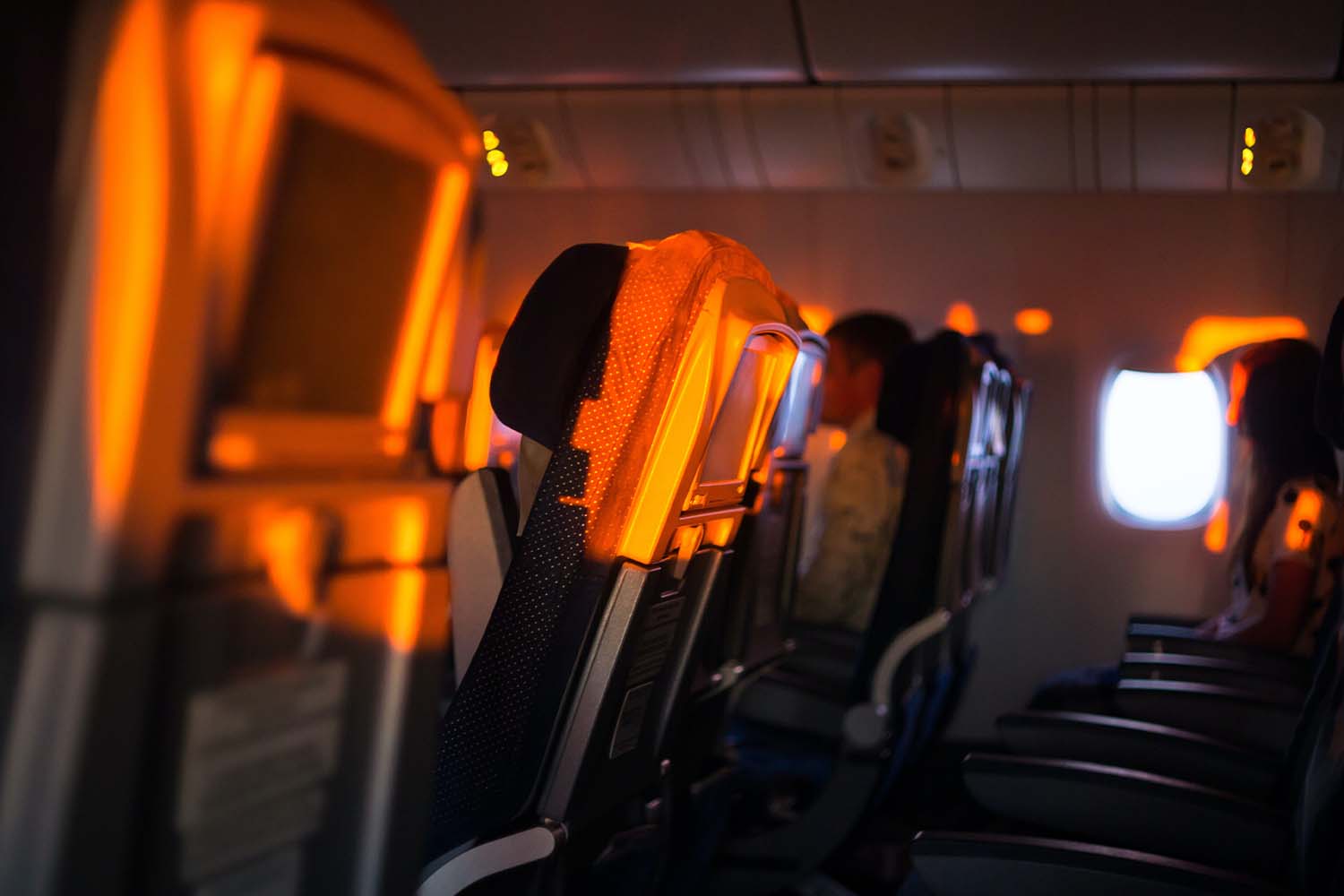 Empty seat in a plane at dusk