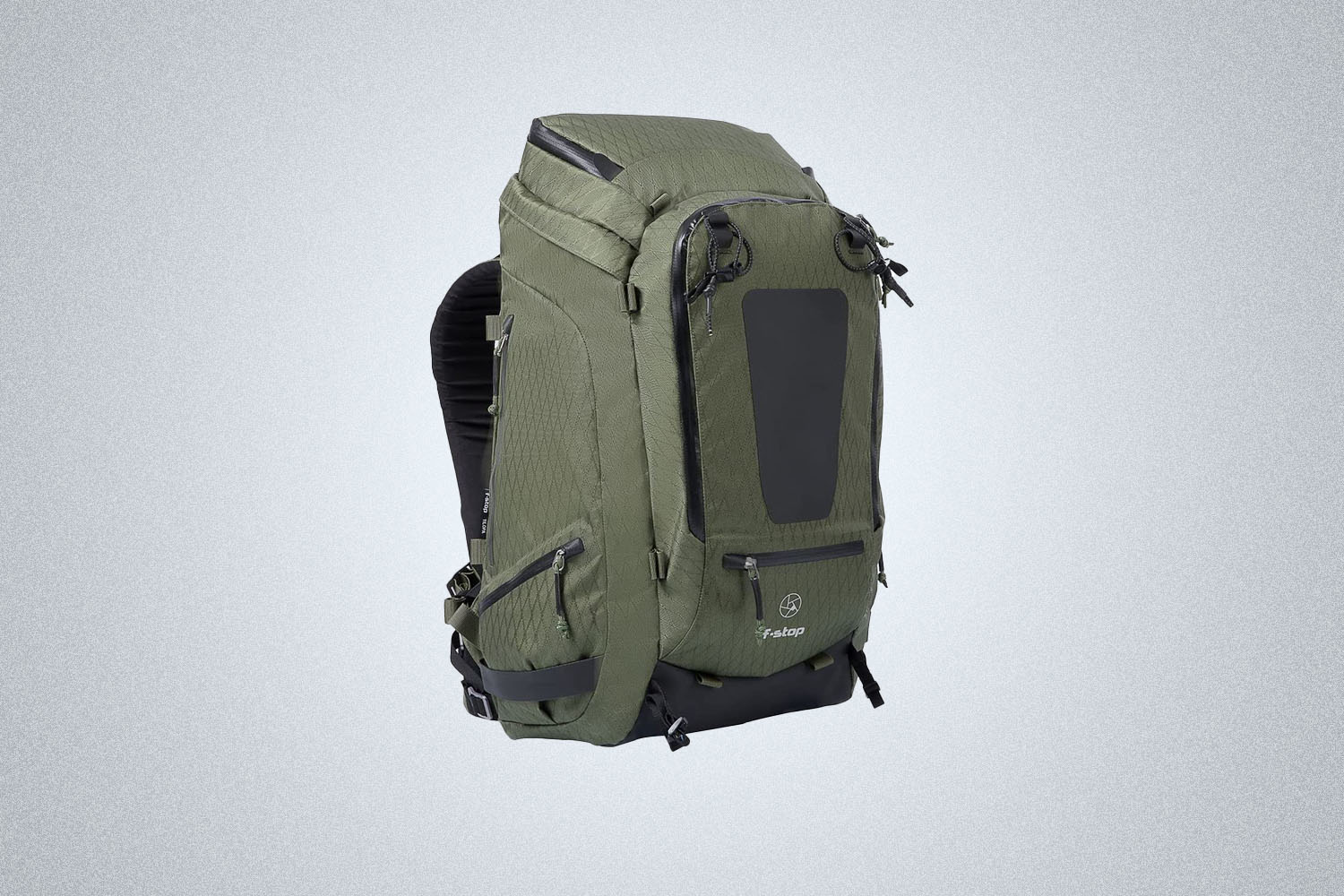 The F-Stop Tilopa 50L DuraDiamond in green on a gray background