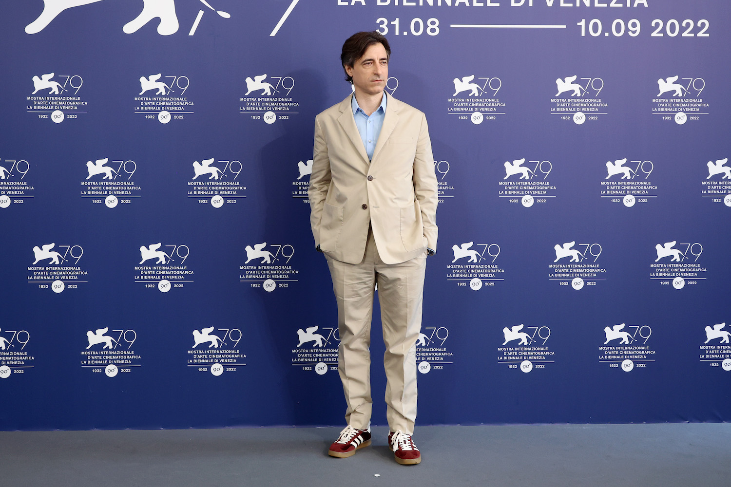 A red carpet photo of director Noah Baumbach at the 79th International Venice Film Festival