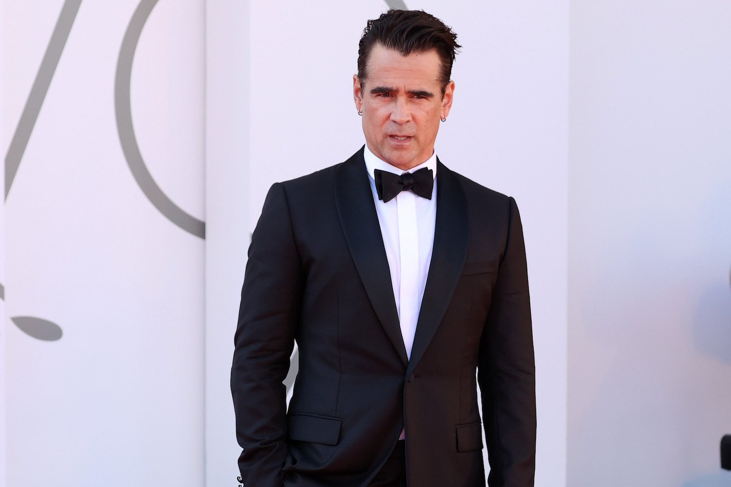 A red carpet photo of actor Collin Farrell at the 79th International Venice Film Festival