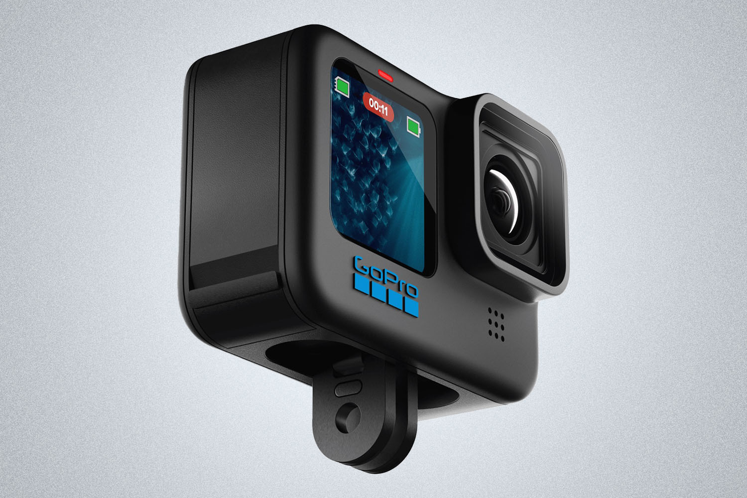 a GoPro Hero11 Black camera on a grey background