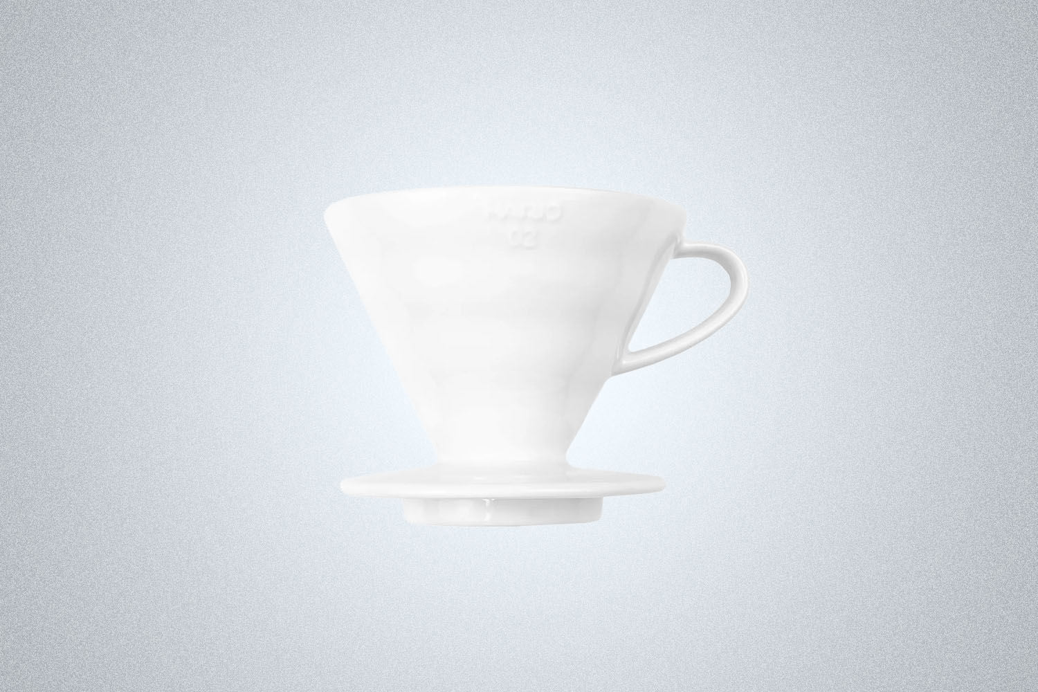 The Hario V60 Pour Over Coffee Maker on a gray background