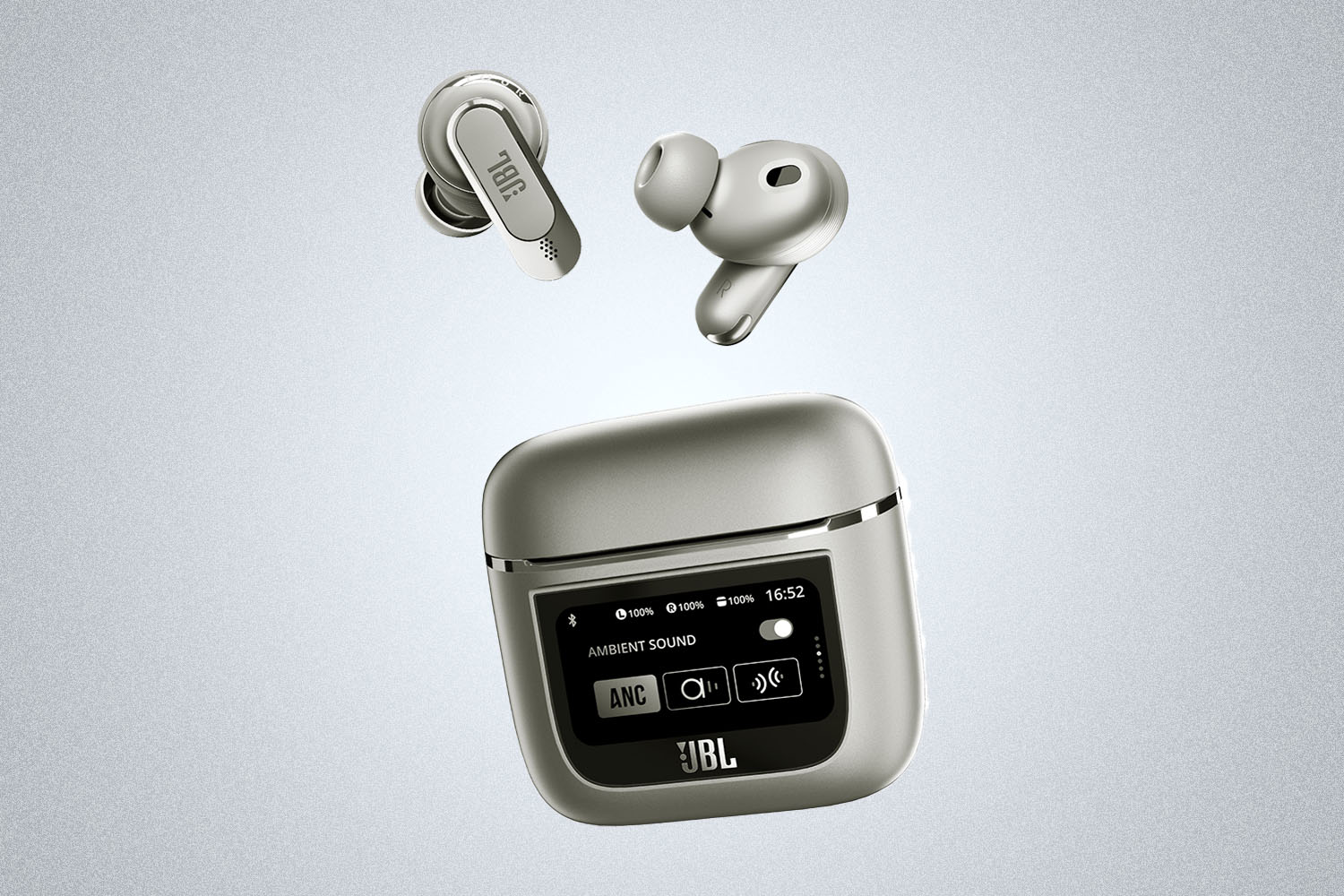 a pair of grey earbuds from JBL on a grey background