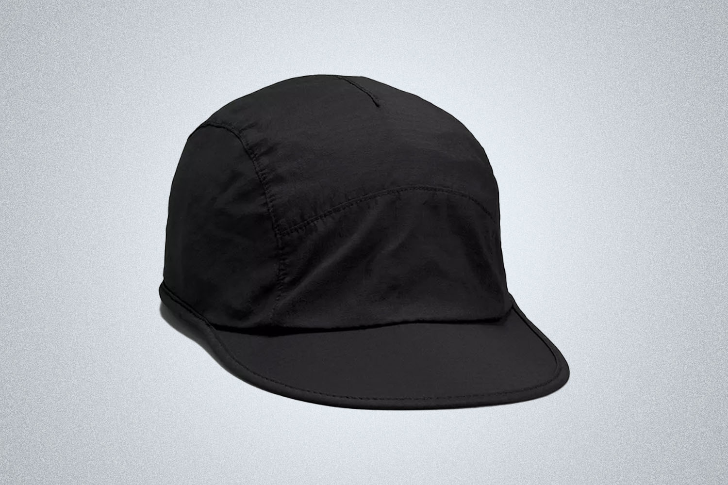 a black hat from the lululemon we've made too much sale on a model on a grey background