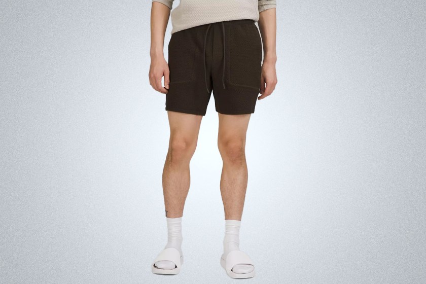 a pair of brown shorts from the lululemon we've made too much sale on a model on a grey background