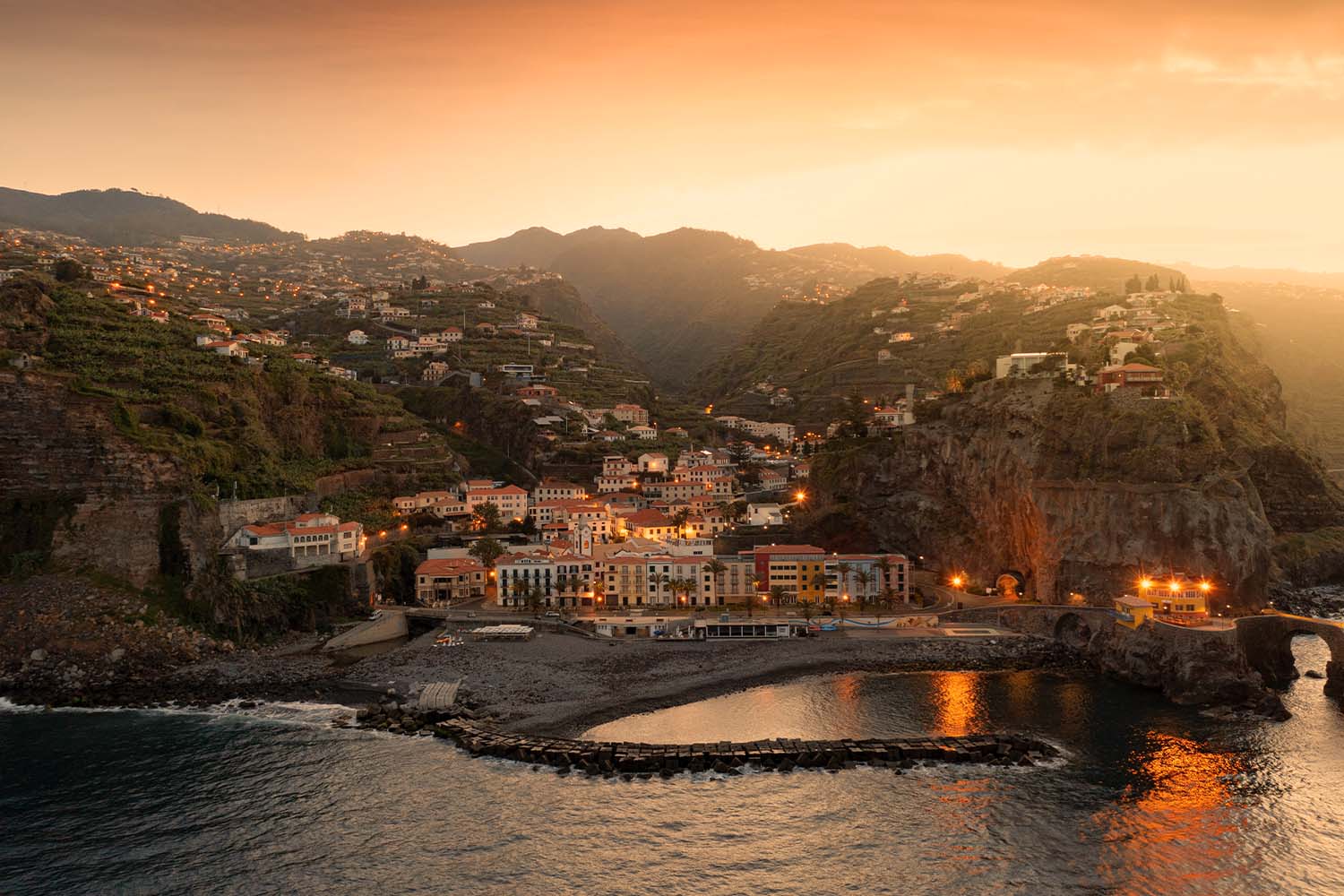 Aerial view of Ponta do Sol beach town at sunset, Atlantic Ocean, Madeira Island, Portugal