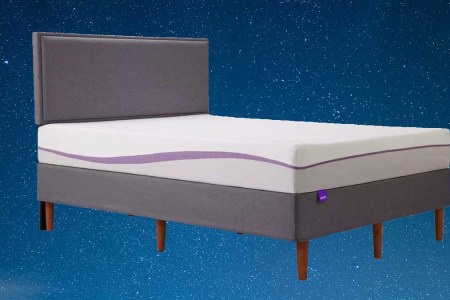 A Purple mattress on a starry blue sky background, now on sale for Labor Day