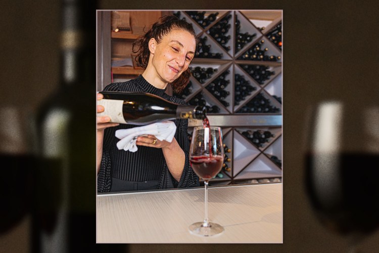 Sommelier Allegra Angelo on Vinya in Miami pours a bottle of wine. She recommends five bottles for you to try.